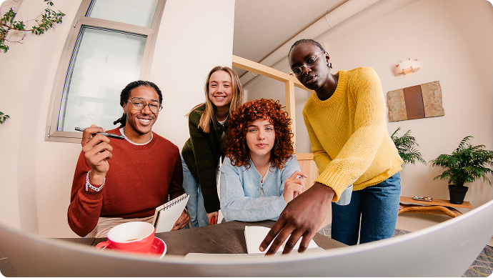 small business team gathered around a table