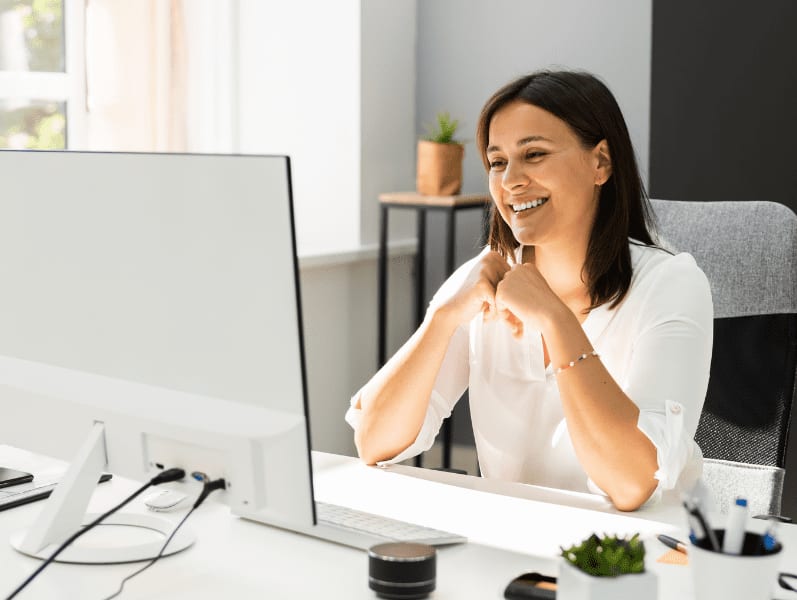 Young happy business woman in video conferencing call.
