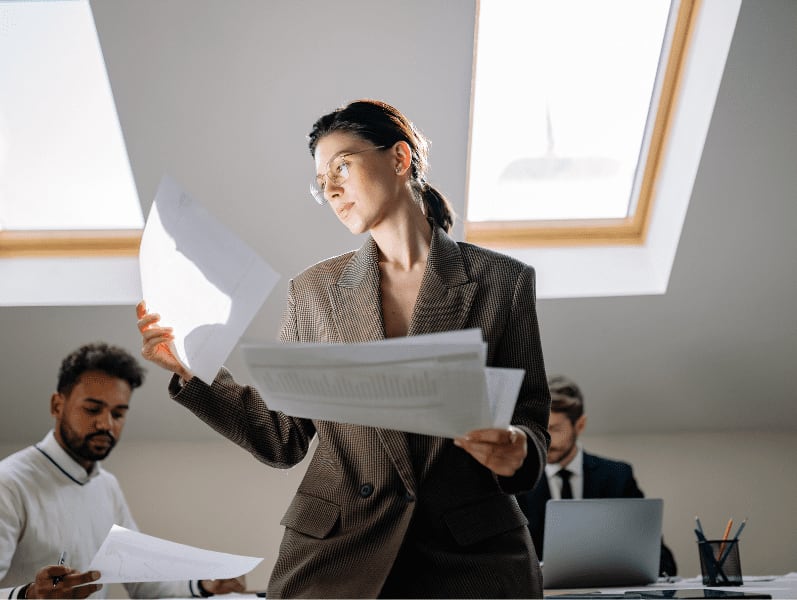 A woman looking the documents.